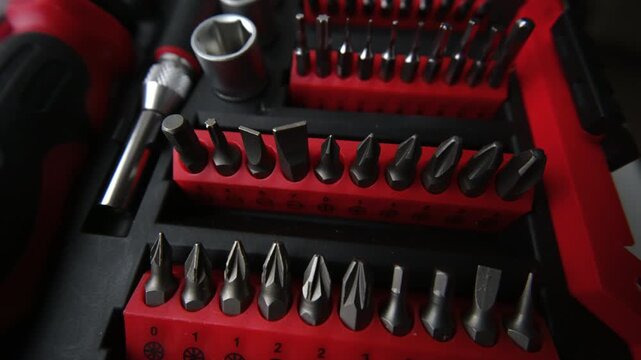 Close up shot of a professional tool kit with screwdriver bits and sockets neatly organized
