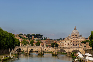 Obraz premium Famous tourist attraction and panoramic view of the Saint Peter`s basilica and the Vatican city architecture in Rome, Italy
