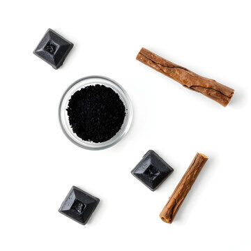 Traditional Finnish salmiakki salty licorice candies in various black diamond shapes