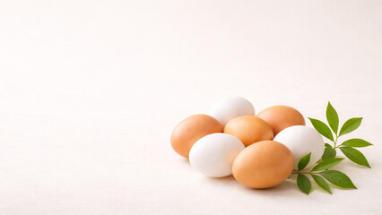 eggs with green leaf on light background and copy space