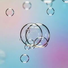 Floating clear soap bubbles on colorful background.