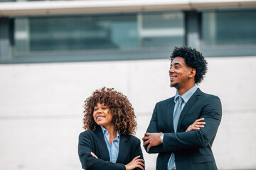 businessman and woman with motivational expression