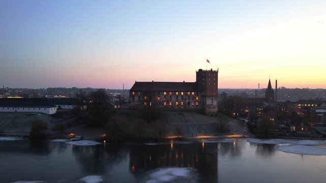 Cinematic drone movement around Koldinghus castle in Kolding, late afternoon
