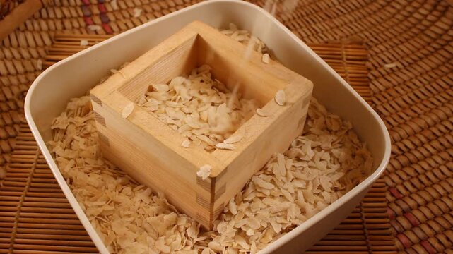 Young Pounded Green Rice in a Japanese Masu Box, known as Cốm in Vietnam, Ambok in Cambodia, and Pinipig in the Philippines