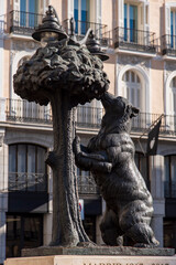 Statue of the Bear and the Strawberry Tree (El Oso y el Madro&ntilde;o) in Puerta del Sol, iconic symbol of Madrid, Spain, bronze sculpture in the historic city center