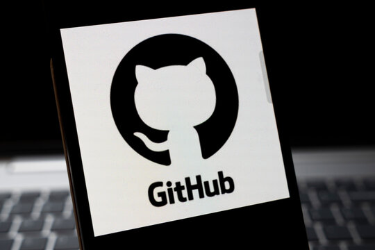 Warsaw, Poland - Feb 24, 2026: Close-up of the GitHub logo displayed on a smartphone, representing technology and collaboration in software development.