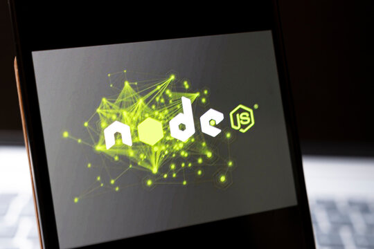 Warsaw, Poland - Feb 24, 2026: Close-up of a smartphone displaying the Node.js logo against a dark background. This technology symbol signifies modern web development.