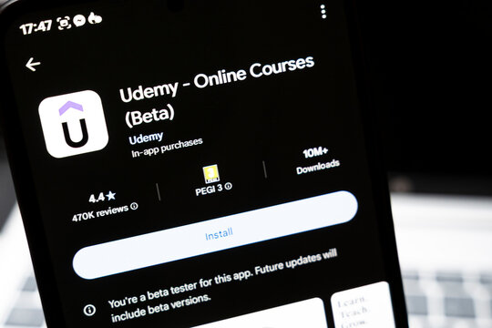Warsaw, Poland - Feb 24, 2026: Mobile screen displaying Udemy app for online courses, showcasing various information including ratings and installation options, reflecting the e-learning trend.