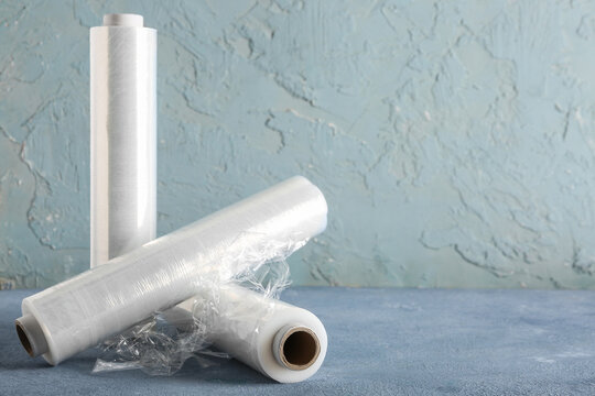 Rolls of stretch wrap on blue  background