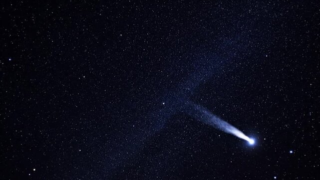 Cosmic display celestial body streaking across dark starry sky