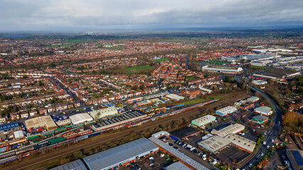 Obraz premium Aerial view of sprawling railway network and industrial estate