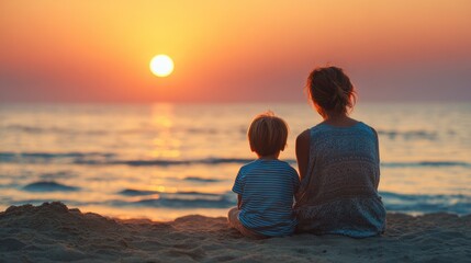 Mothers Day, Valentines Day, love holiday theme. Two children, a woman and a boy, seated on the beach, gazing at the setting sun. The sun casts a golden hue over the water.