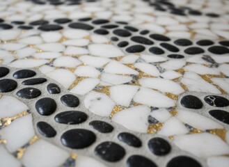 Close Up Macro Shot Of A Mosaic Pattern With Black White And Gold Pebbles And Ceramic Tiles