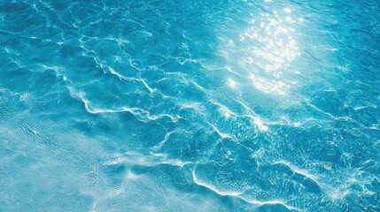 Obraz premium Therapy stress release treatment, health lifestyle. A closeup of a swimming pool with clear blue water, illuminated by the suns rays reflecting off the surface, creating a mesmerizing effect.