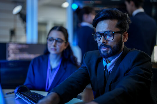 Cloud infrastructure architect debugging microservices containerization orchestration. DevOps engineer configuring kubernetes cluster deployment pipeline during critical system migration.