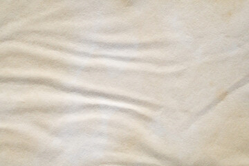 Obraz premium Old vintage paper texture background with aged stains and antique yellowed parchment effect