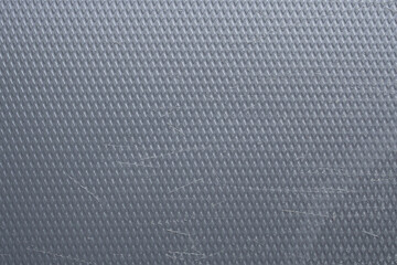Grey diamond plate texture background with scratched rubber surface