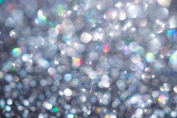 Shiny luxury glitter rainbow glow light flare with bokeh background © Kwangmoozaa