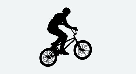 Obraz premium Silhouette of a BMX rider performing a trick on a white background