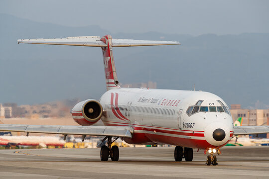 Taipei, Taiwan - 2018 April 18: A Far Eastern Air Transport McDonnell Douglas MD-82 aircraft (registration B-28007) taxis on the taxiway at Taipei Songshan Airport.
