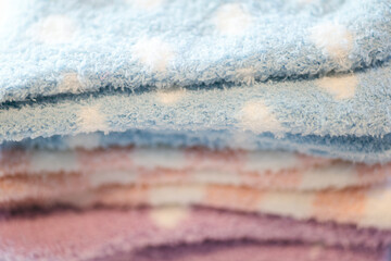 Stack of Soft Pastel Socks &ndash; Cozy Winter Textile Background