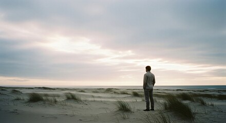 Man Gazing at Ocean Sunset Beach Landscape Peaceful Reflection Solitude Nature Photography Wellness