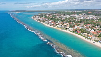 Fototapeta premium Fantastic aerial view of Barra de Sao Miguel beach on a sunny summer day in February 2026 near Maceio City. Alagoas State, Brazil 