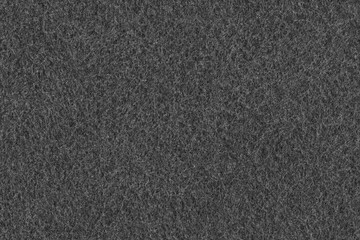 Black fabric material background texture. Seamless gray felt cloth fibre pattern.