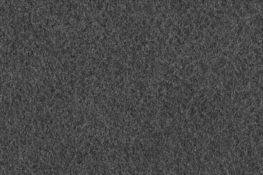 Black fabric material background texture. Seamless gray felt cloth fibre pattern.