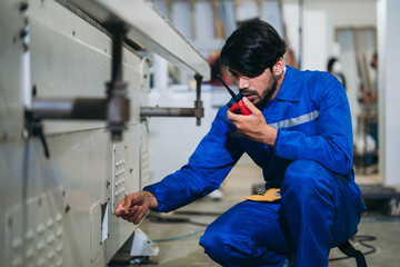 Professional Woodworker Measuring, Cutting and Installing Timber in Factory. Carpentry and Wood Manufacturing Process in Industrial Workshop