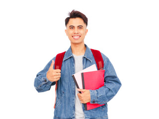 Obraz premium Smiling Asian male college student holding book and backpack giving thumb up on white background