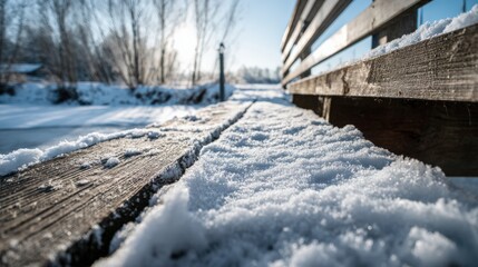 Snow-covered wooden boardwalk stairs from extreme low perspective in winter