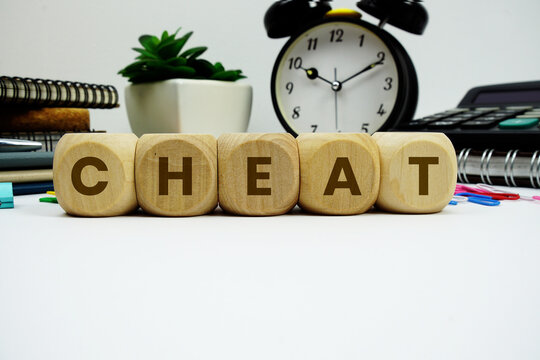 CHEAT alphabet letters with alarm clock and calculator on white background