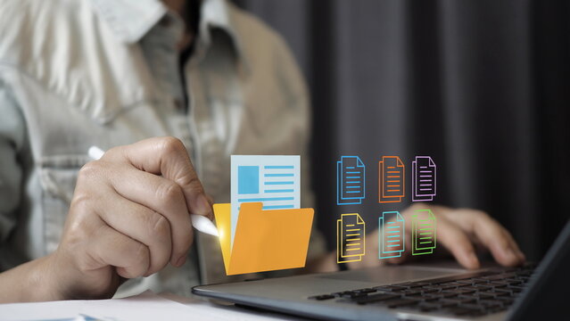 Digital document management concept with professional organizing virtual files and folders on laptop. Data storage, cloud archive, paperwork automation, information system,