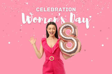 Fototapeta premium Young woman celebrates Women's Day with a balloon