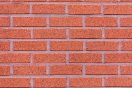 Close Up Red Brick Wall Texture with Visible Grout Lines
