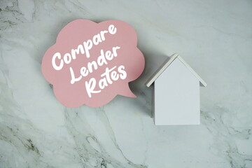 Compare Lender Rates text written on speed bubble and house model