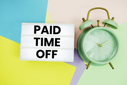 Paid Time Off text in lightbox with alarm clock on pastel background