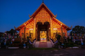 Fototapeta premium Chiang Rai, Thailand - November 28 2025 : External view of the Wat Jed Yod temple during sunset at Chiang Rai, Thailand.