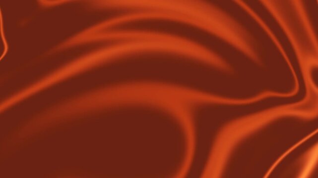 A beautiful abstract background featuring rich brown and orange colors with soft, wavy, and flowing texture creating smooth gradients