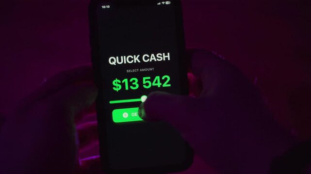 Debtor takes quick money in mobile app, close-up