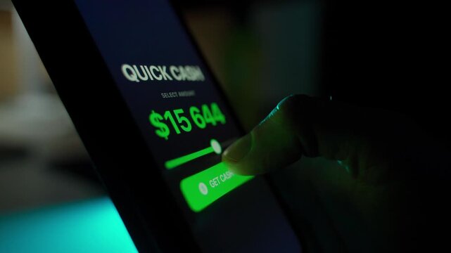 Finger selects dollar amount to get quick money, close-up in a dark room with blue backlight. twenty-five thousand debt