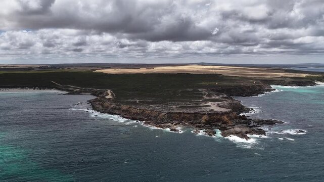 Pelamis Point, Sleaford, South Australia &ndash; 4K Aerial Drone Footage of Fishery Bay, rocky headlands, limestone cliffs, ocean waves, rugged Eyre peninsula coastline in Lincoln National Park.