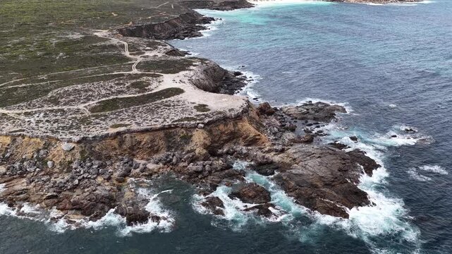Pelamis Point, Sleaford, South Australia &ndash; 4K Aerial Drone Footage of Fishery Bay, rocky headlands, limestone cliffs, ocean waves, rugged Eyre peninsula coastline in Lincoln National Park.