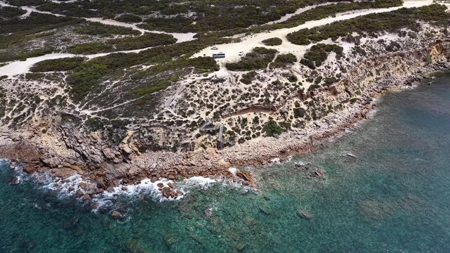 Pelamis Point, Sleaford, South Australia &ndash; 4K Aerial Drone Footage of Fishery Bay, rocky headlands, limestone cliffs, ocean waves, rugged Eyre peninsula coastline in Lincoln National Park.