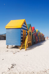 Naklejka premium Colorful beach huts at Muizenberg Beach