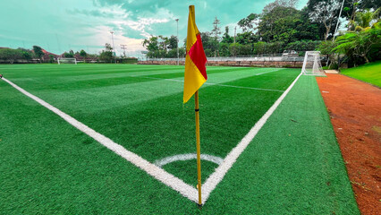 CORNER FLAG ON THE FOOTBALL GREEN FIELD © faiz