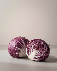 Obraz premium Radicchio Half Cut Close Up – Organic Italian Red Chicory with Water Drops