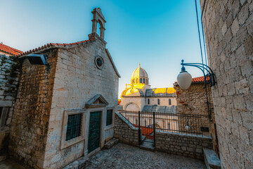 Historic square with the stone Cathedral of Saint James in the old town of Sibenik, beautiful Dalmatian architecture, Croatia.