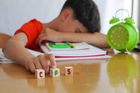 CFS. mental health concepts. preteen boy frustrated doing homework, importance of educational needs and special attention to this problem.